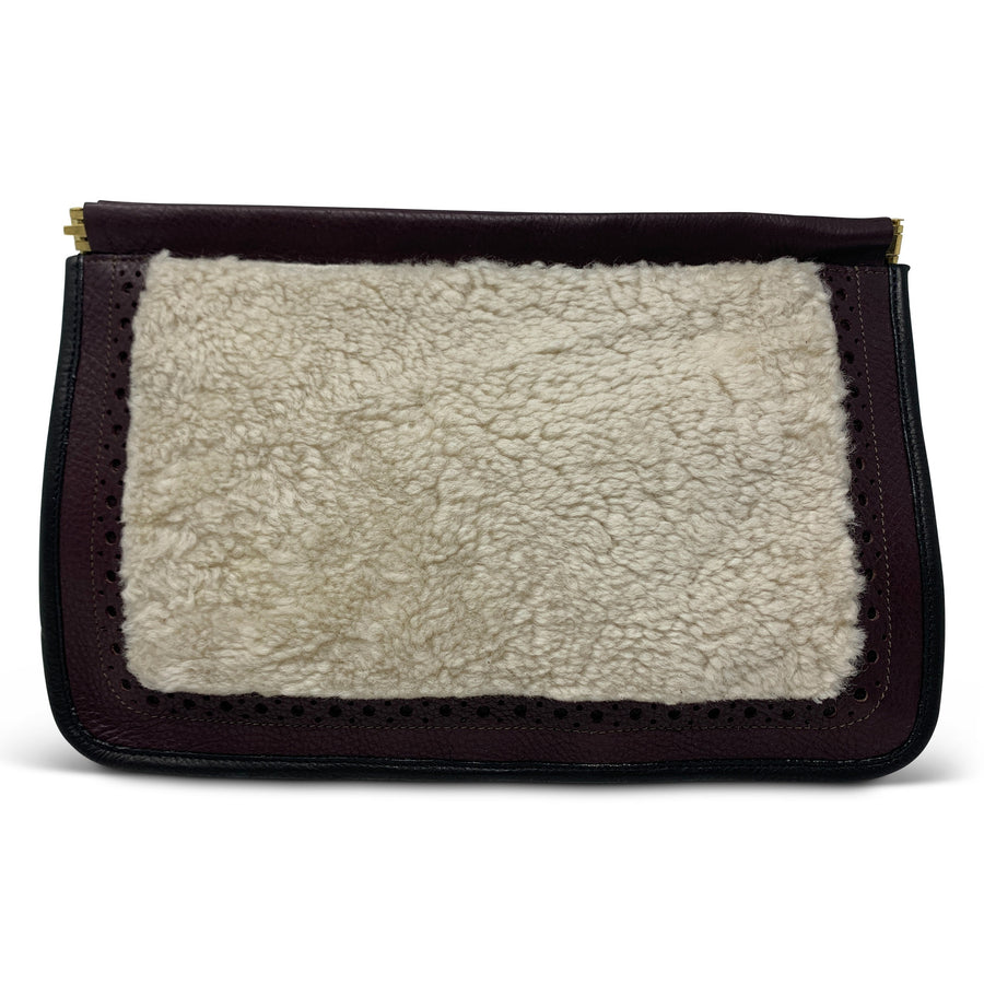 OXBLOOD AND NATURAL SHEARLING SNAP CLUTCH