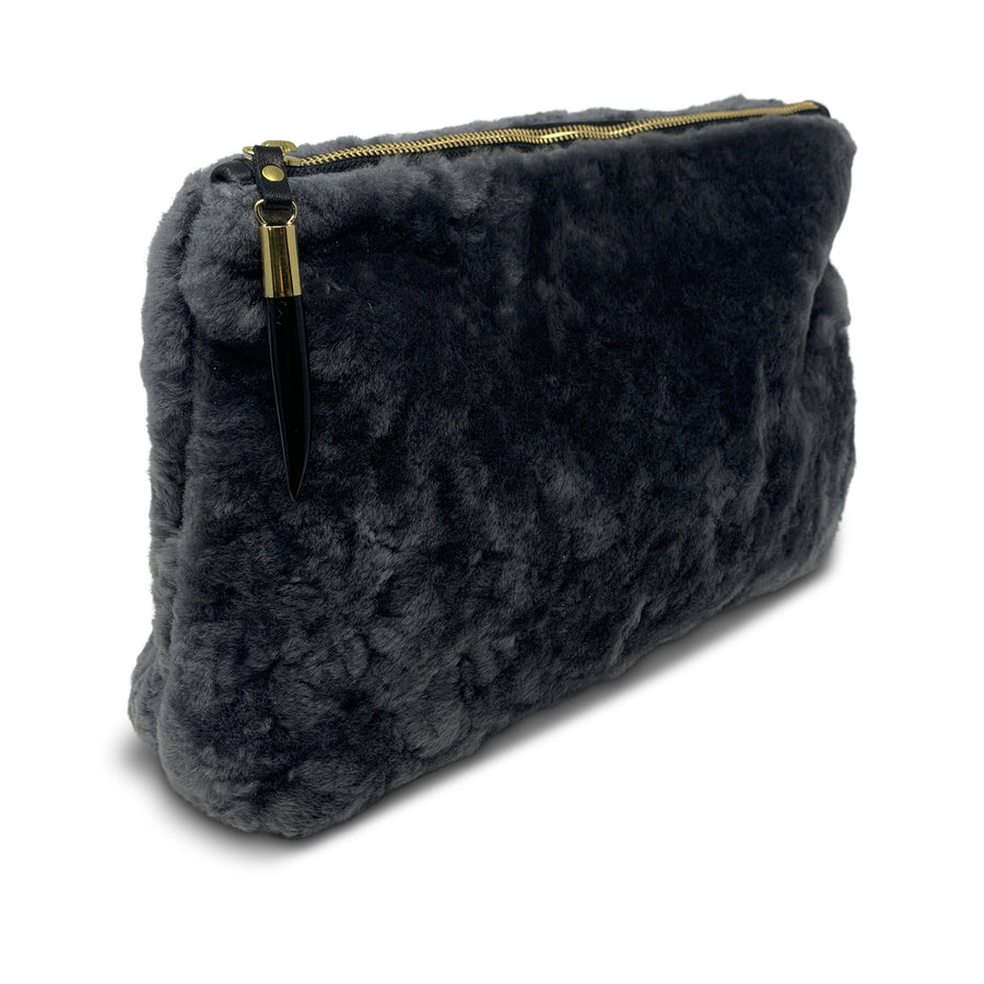 Shearling clutch online bag